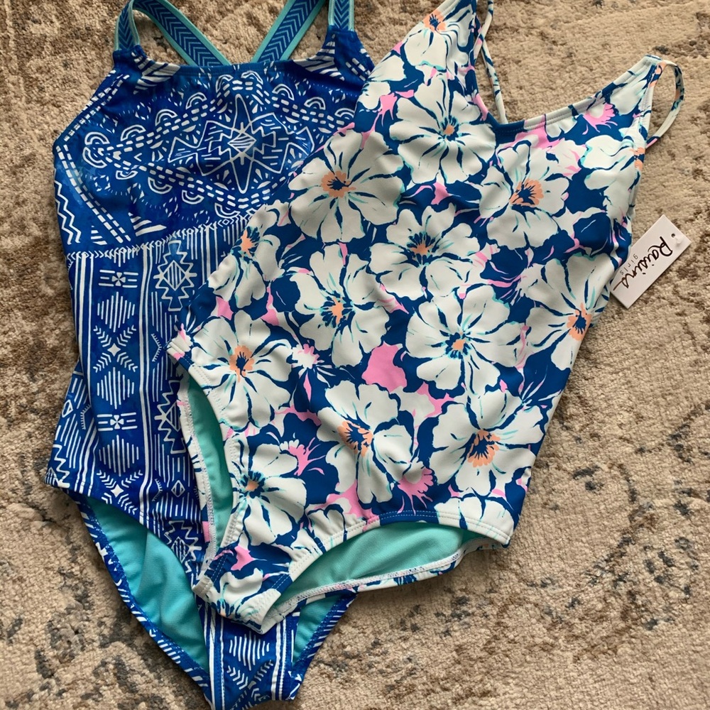 Brand new girls swimsuits with tags attached